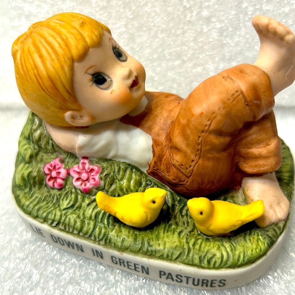 Vintage figure ceramic  a little boy relaxing